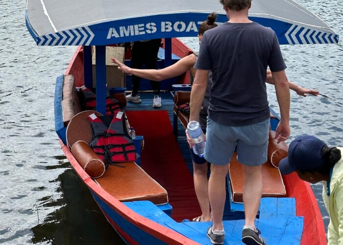 Boat tour in Kibuye or Gisenyi, clients enter boat and ready to explore lake kivu in Rwanda